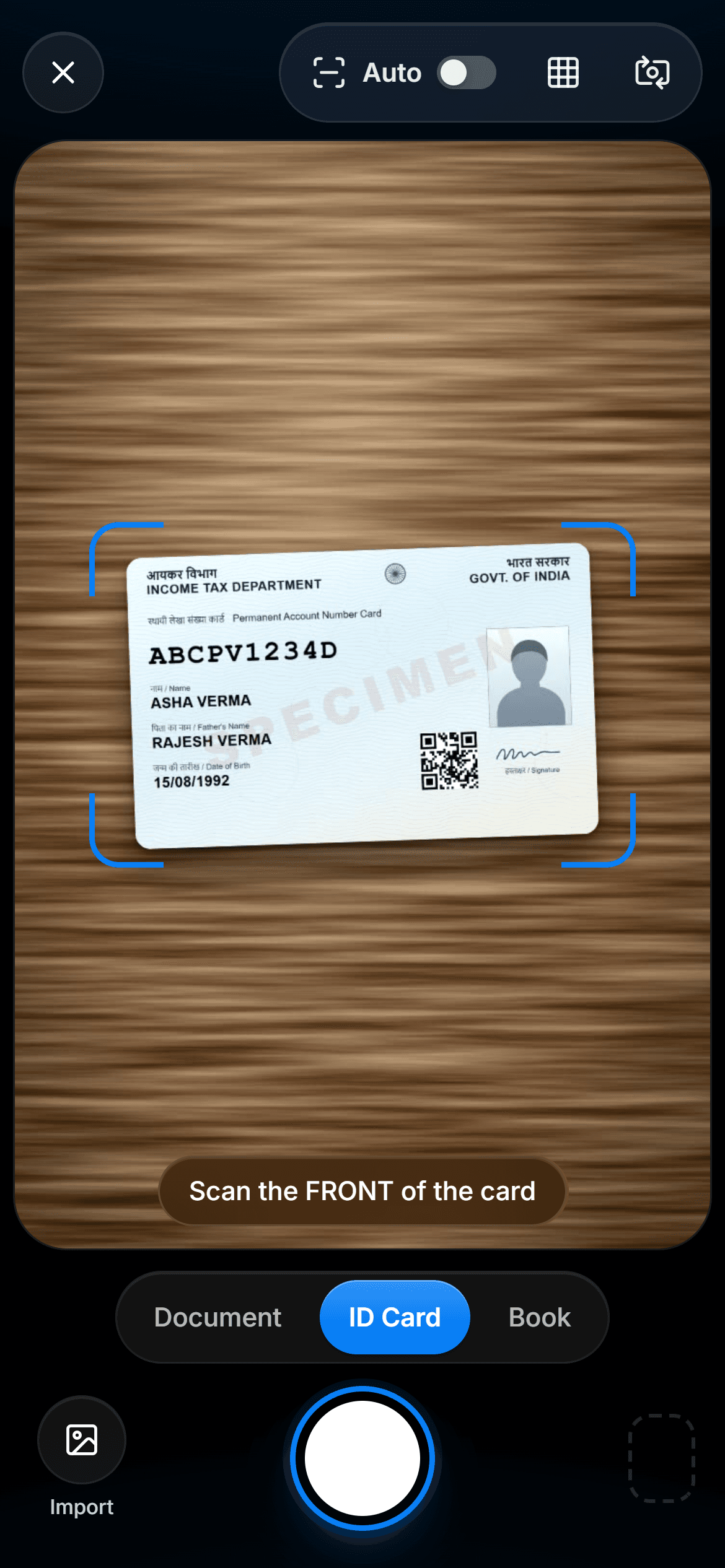 DigiSafe scanner framing a PAN card on a table, in ID card mode